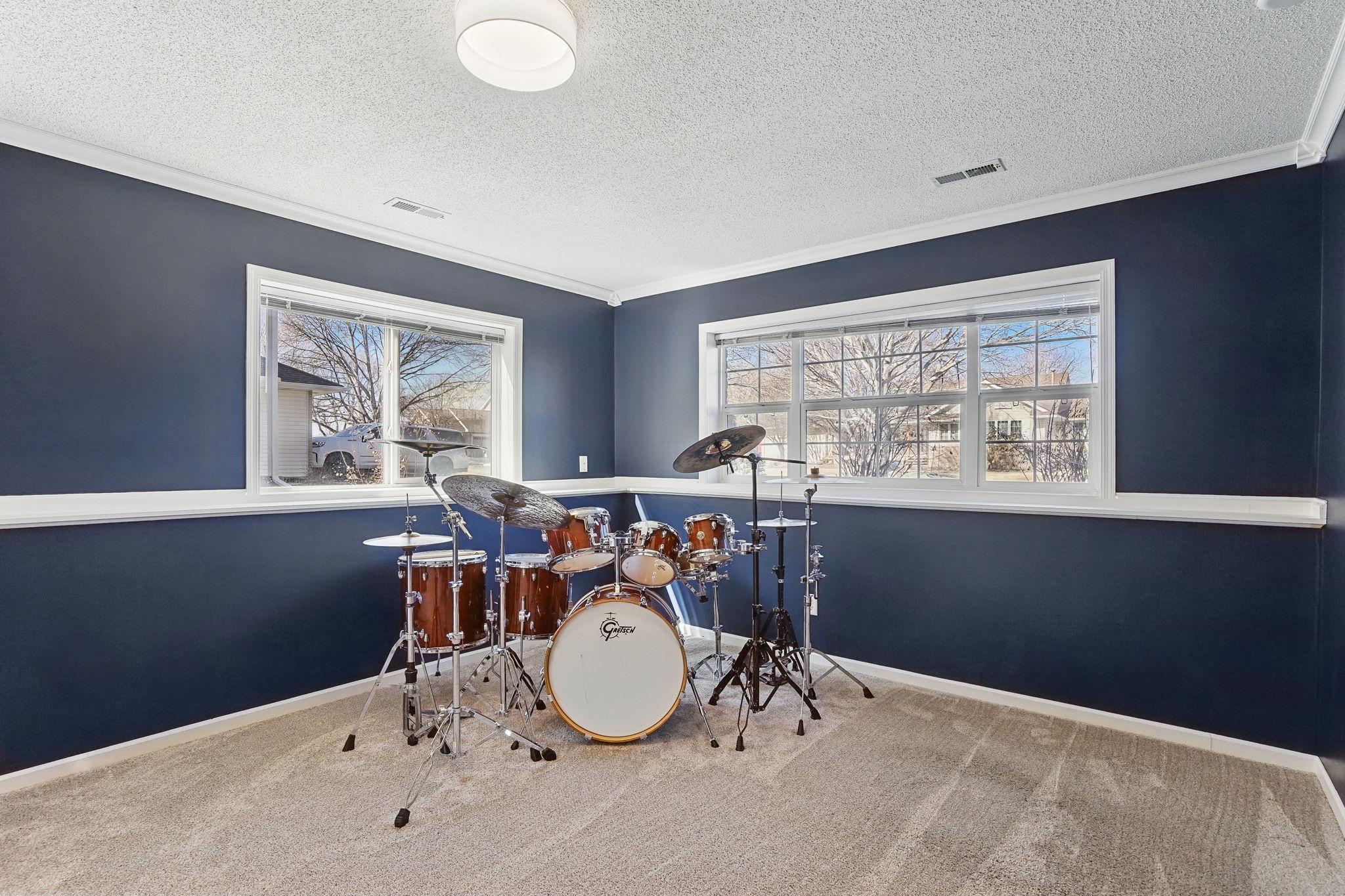 This bonus room has the potential to be converted into a fourth bedroom