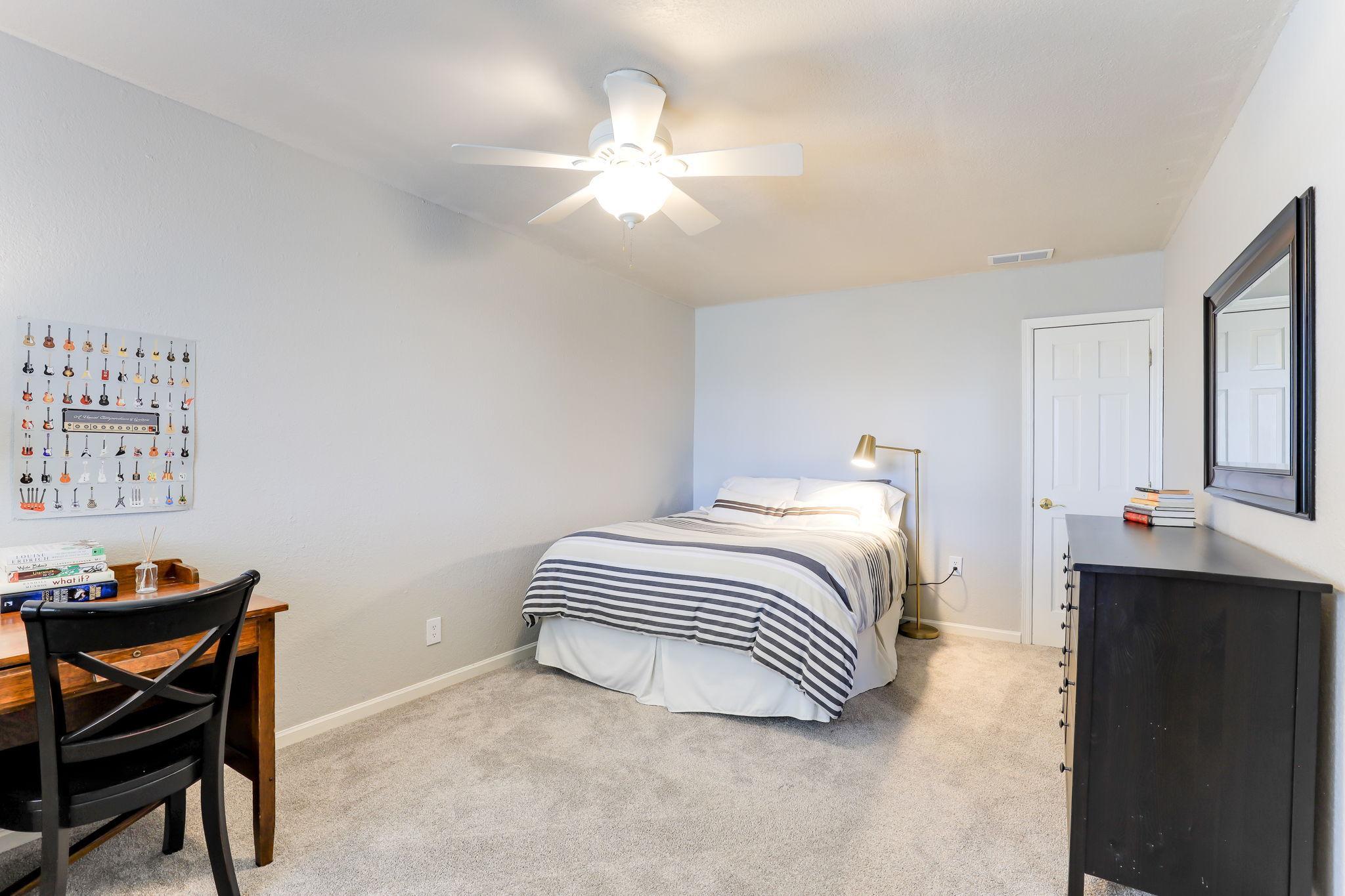 Second bedroom on the lower level with walk-in closet