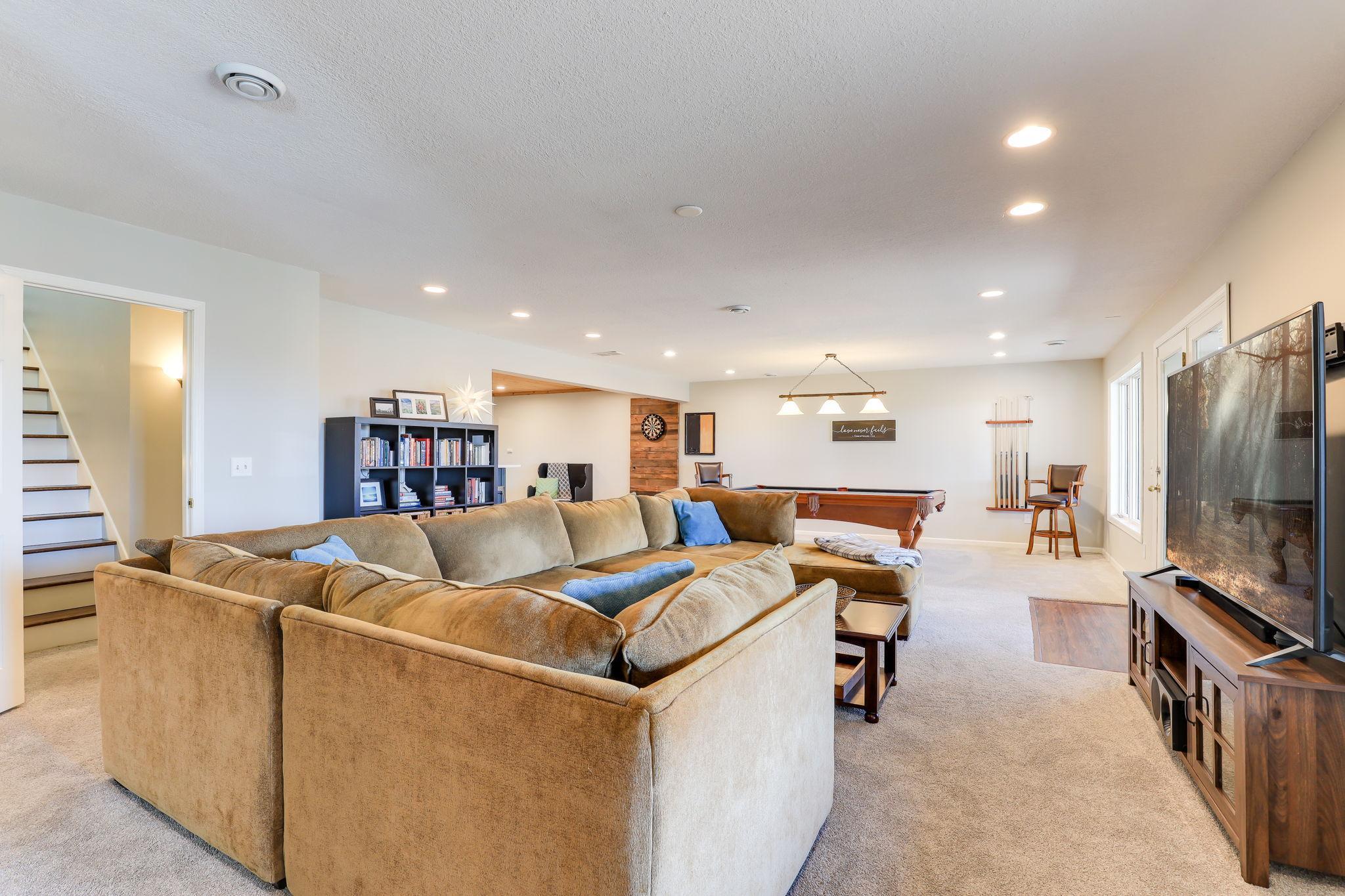 Spacious recreation room with a walk out lower level