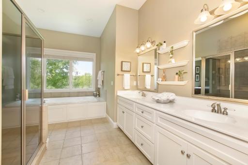 Hydronic in-floor heat; double vanity, jetted tub, separate water closet