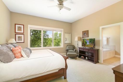 Main floor Primary Suite with 8' x 11' walk-in closet; Samsung stacked washer/dryer