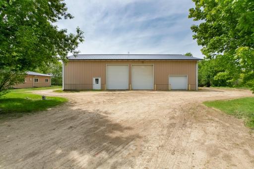42' x 70' Morton building with 3 service doors; electricity and outlets; cement floor; Right Side: 22' x 42' with standard garage door; Left Side: 42' x 48' with 2-14' overhead doors. Manure Bunker 16' x 33'
