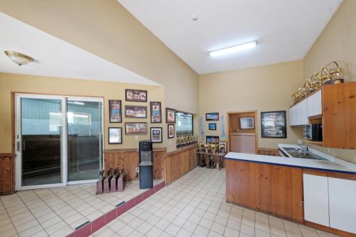 Customer Lounge with kitchenette 3/4 bath; access to Indoor Arena, Outside, and Stall Aisle
