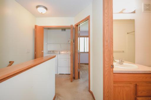 Upper level includes: laundry, full bath, and two bedrooms