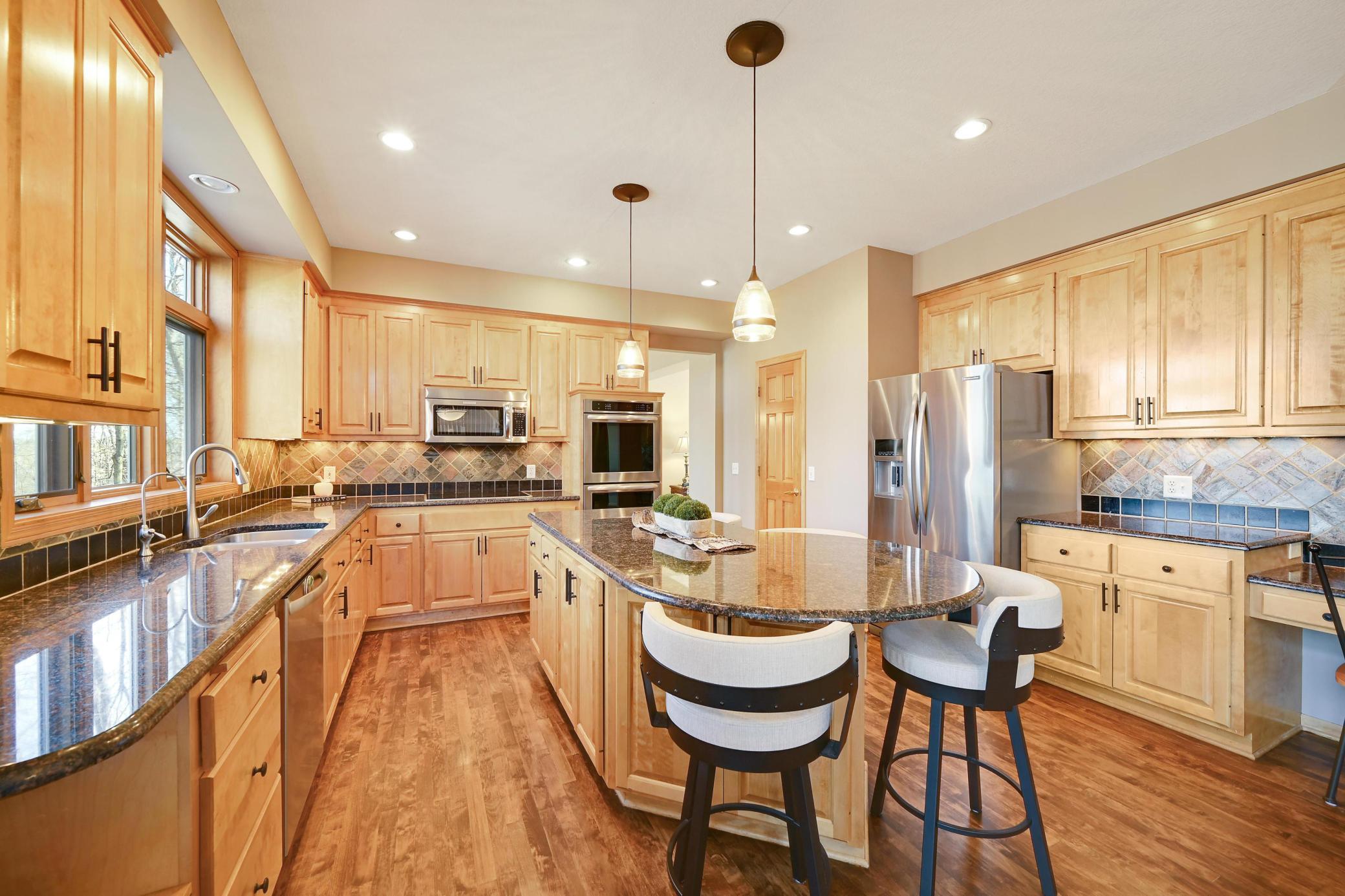Bright kitchen, updated windows. Reverse Osmosis water system. Sweep inlet under cabinets (central vac) makes clean up a breeze.