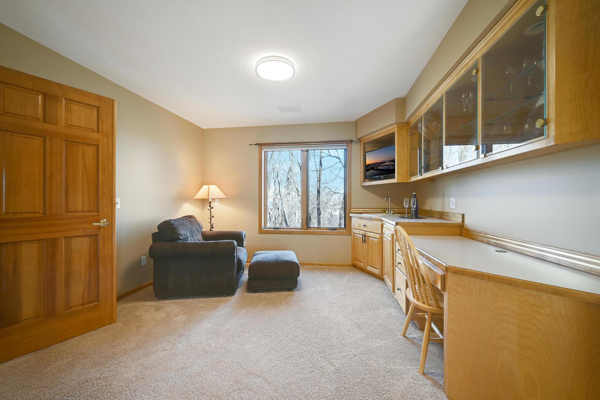No need to head downstairs - mini fridge and sink in the sitting room. You could put your coffee maker up here!