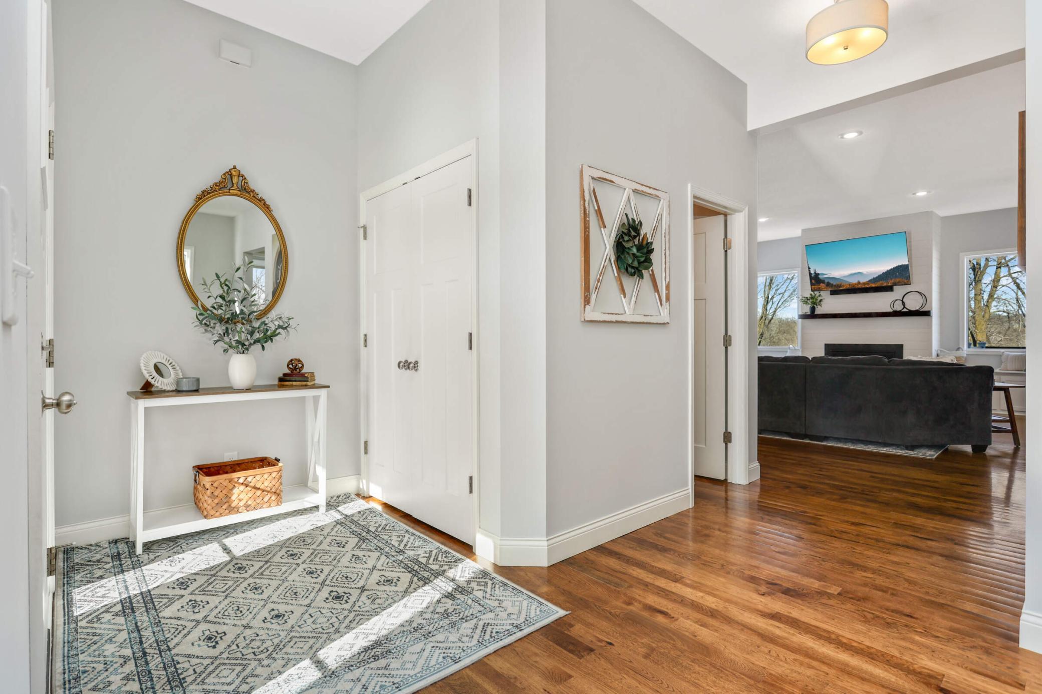 Large foyer and 10 foot ceilings welcomes you upon entry.
