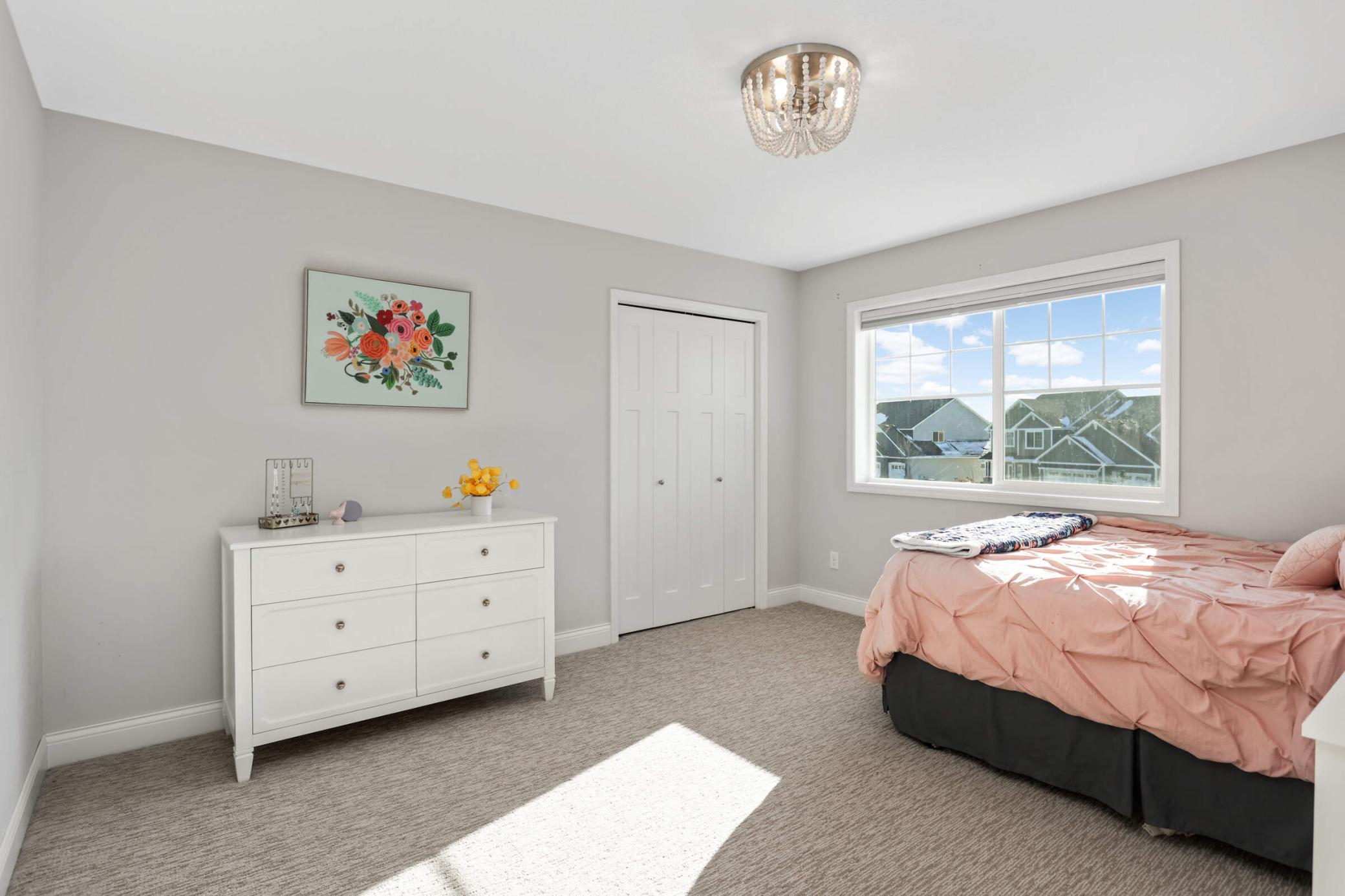 Second of five upper level bedrooms.