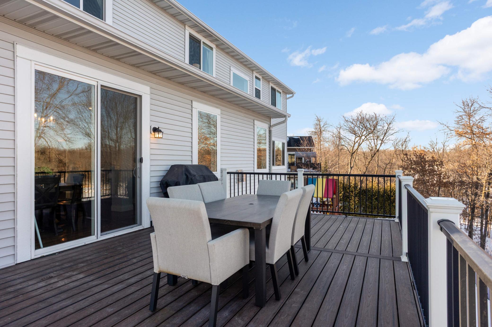 Maintenance free deck! Deck was upgraded and built to accomodate a three/four season porch.