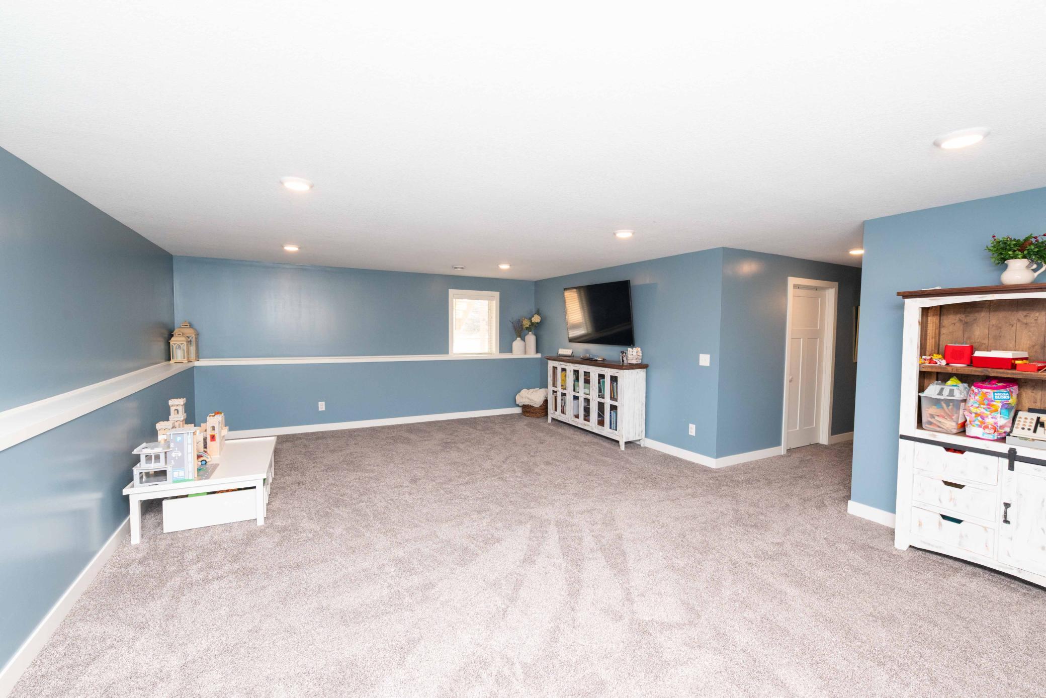 Newly finished lower level completes the enjoyment of this fabulous BETTER THAN NEW home. Just move right in!