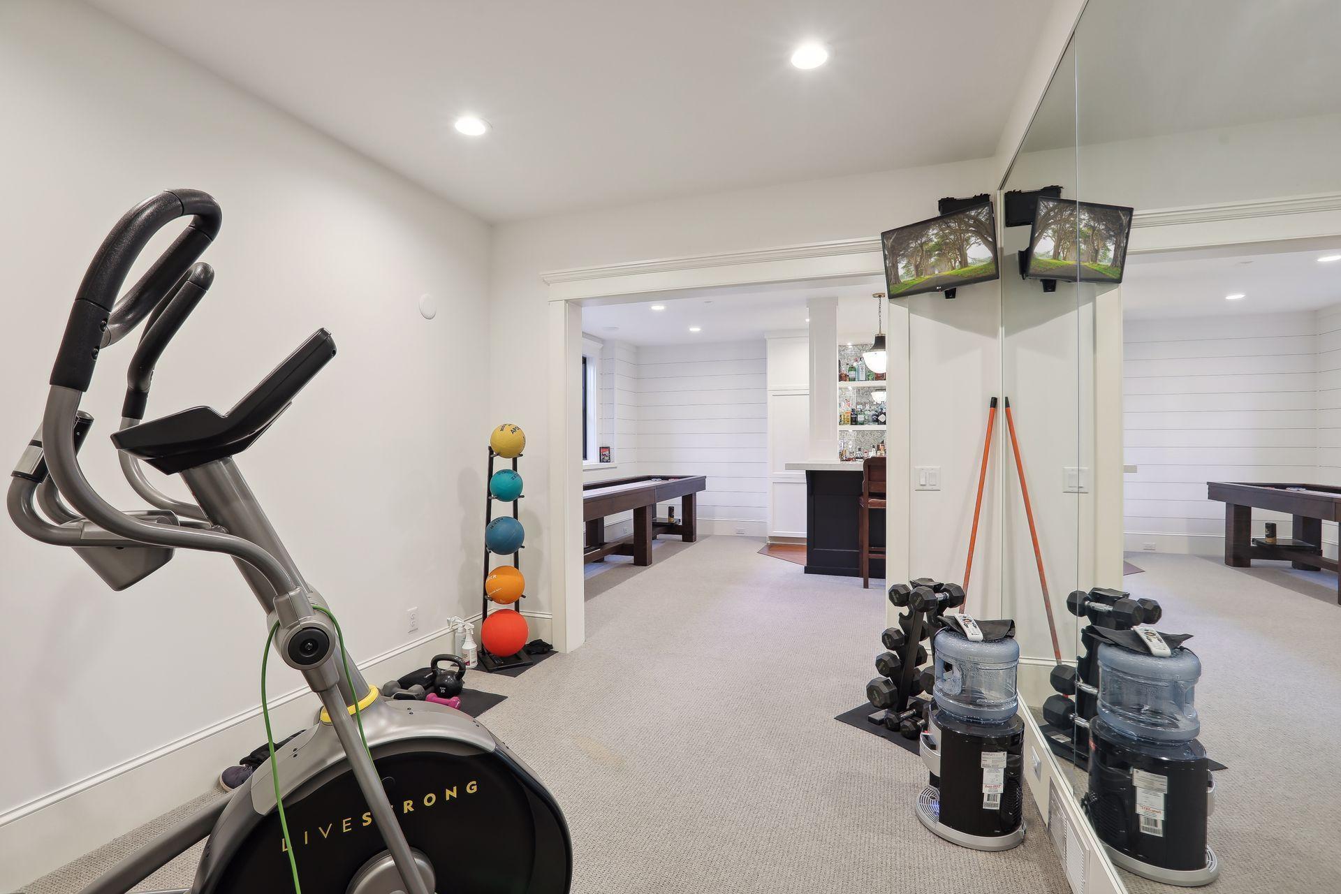 Mirrored dedicated exercise room when you don't feel like going for a walk to the lake:)