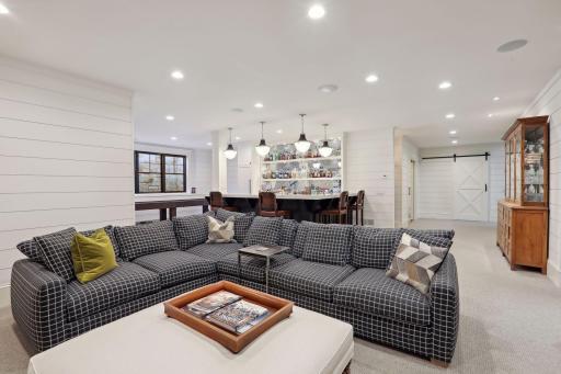 Ample seating to congregate with family and friends- this space is SO much larger than it photographs!