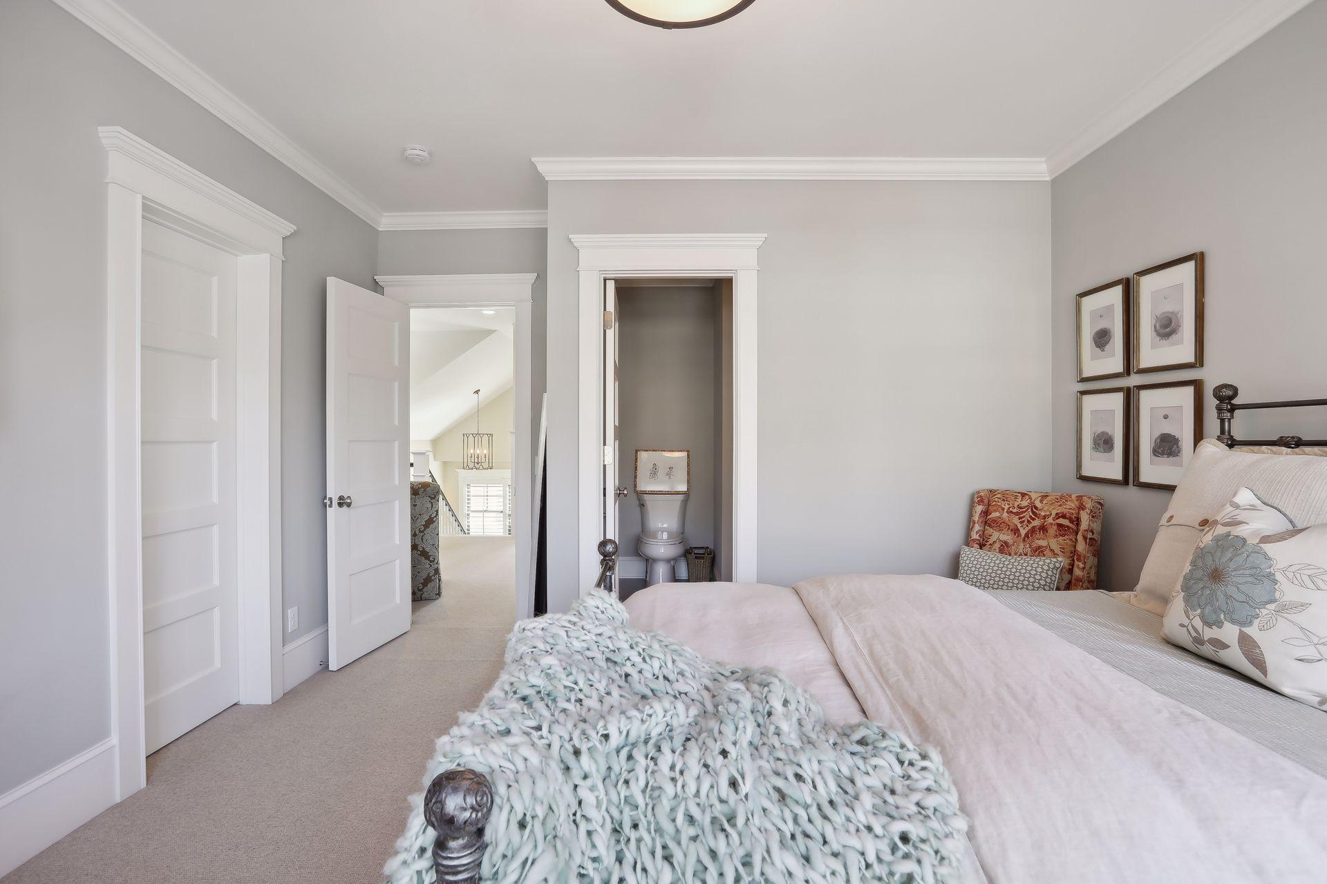 Custom upper level closets for smart storage of seasonal clothing.