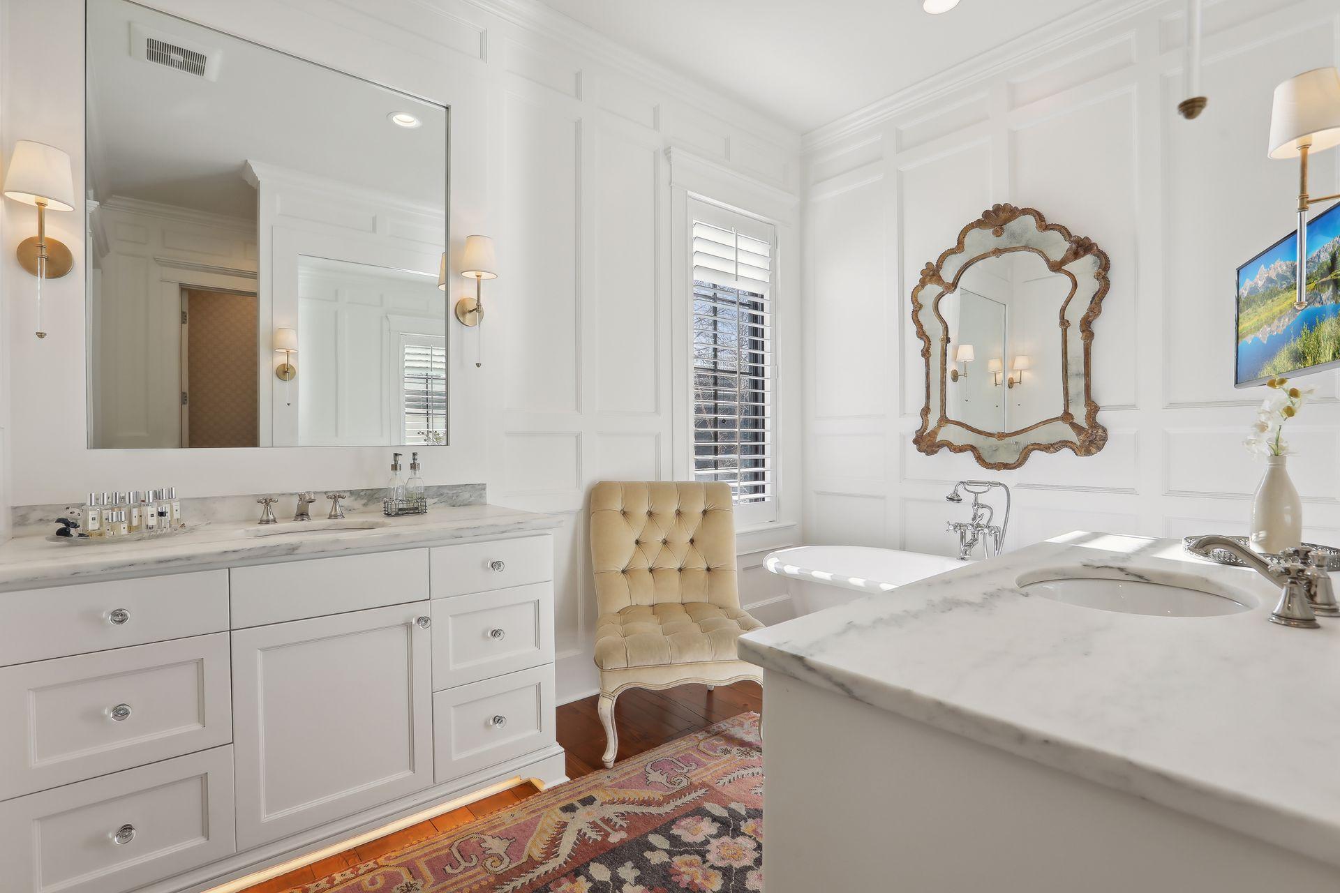 Dual vanities with undermount sinks are elegant and provide for a clean and relaxing bathroom experience.