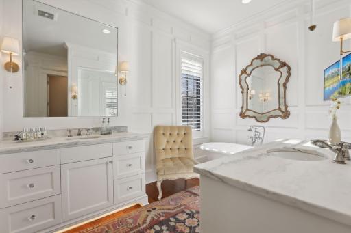 Dual vanities with undermount sinks are elegant and provide for a clean and relaxing bathroom experience.