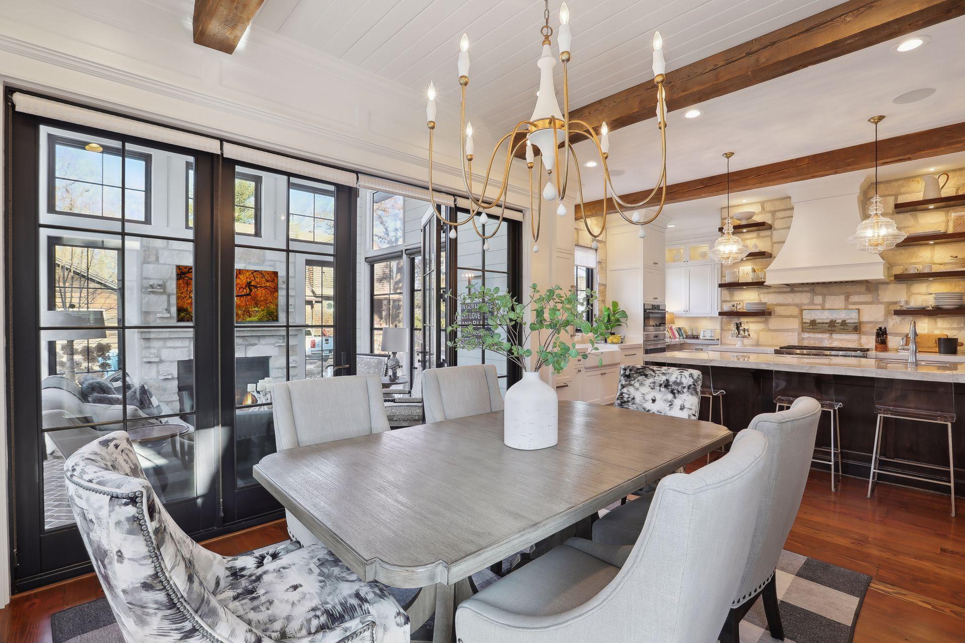 Dining is conveniently located with easy access to the porch, kitchen, Great Room and exterior patio.