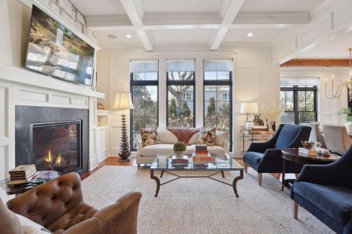 Large Great Room with custom floor to ceiling Loewen Windows and phantom screens.