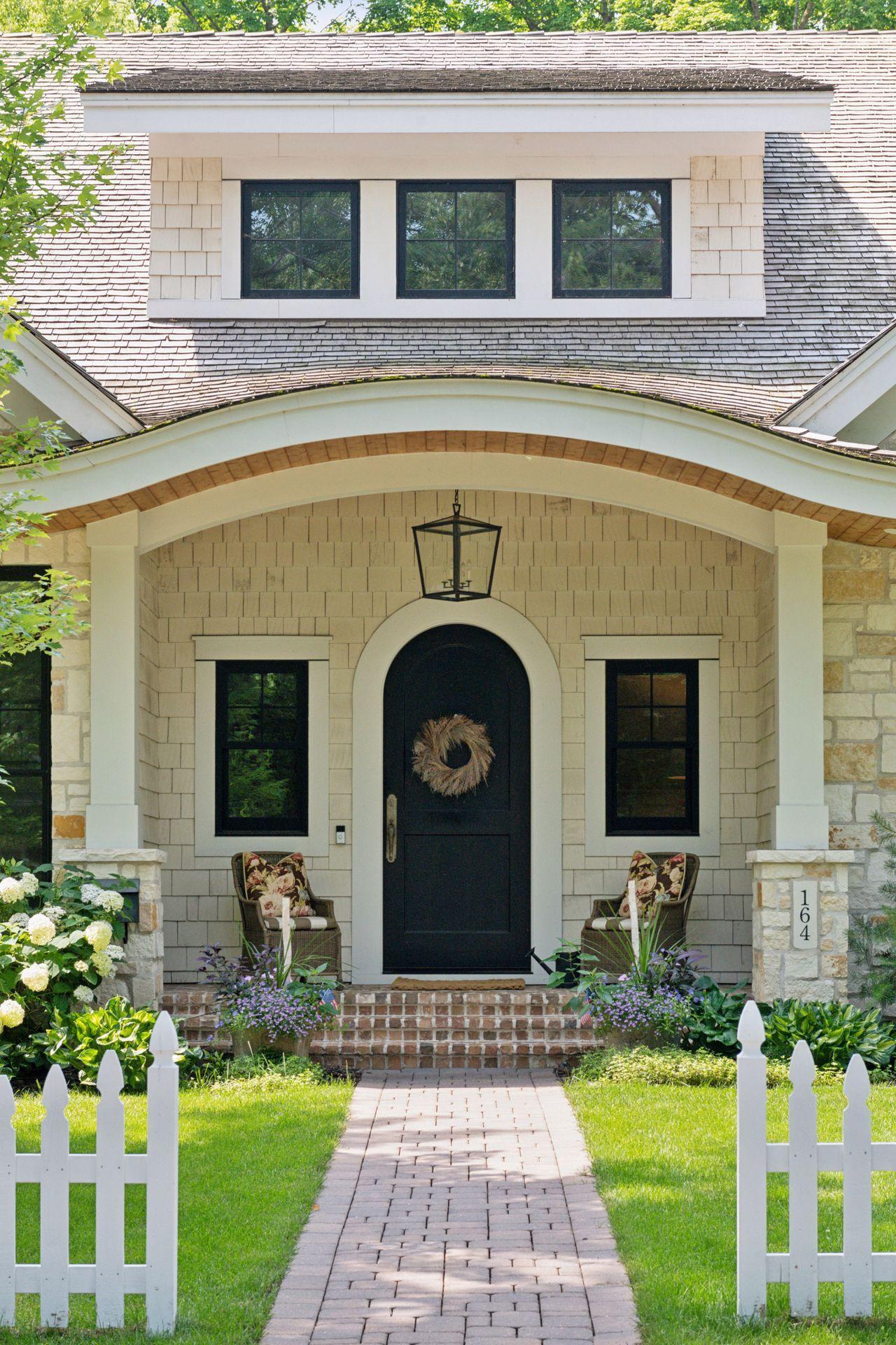 Enjoy the coziness of the front porch and the serenity of the quiet street.
