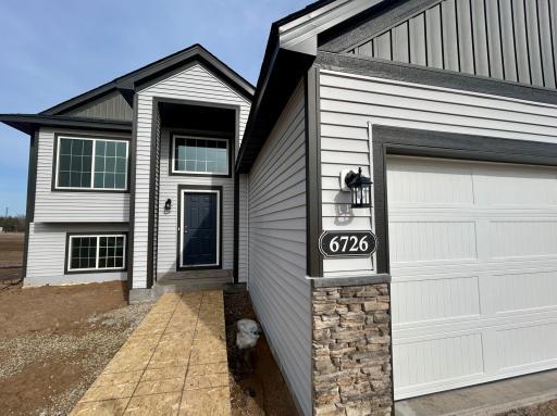 6726 Granby St, North Branch - Sod and Irrigation Included!