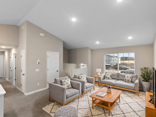 Living Room. Virtually Staged. Photo is taken of another home with similar plan and finishes.