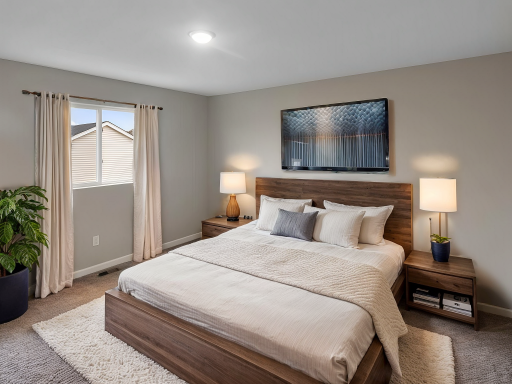 Primary Suite. Virtually Staged. Photo is taken of another home with similar plan and finishes.