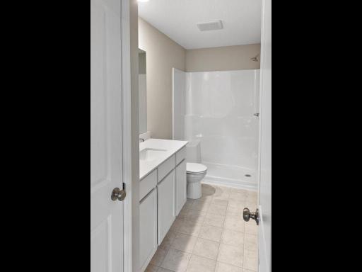Private Primary Bathroom. Photo is taken of another home with similar plan and finishes.