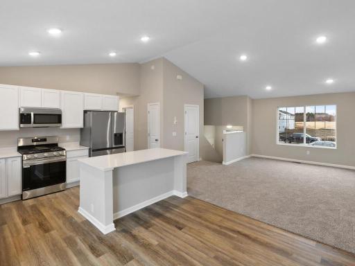 Photo is taken of another home with similar plan and finishes.