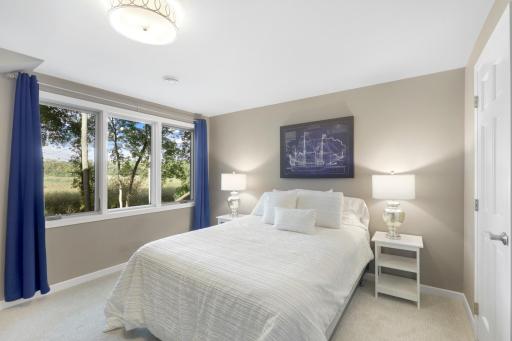 The lower level, a west facing walk-out elevation with look out windows, features a guest suite with a newly remodeled walk-thru bathroom, a large family room, a large game room and abundant dedicated storage.