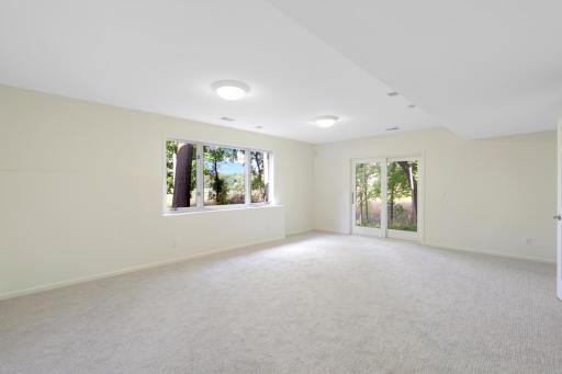The lower level, a west facing walk-out elevation with look out windows, features a guest suite with a newly remodeled walk-thru bathroom, a large family room, a large game room and abundant dedicated storage.