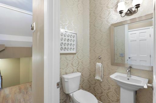 The second of two main floor half bathrooms.