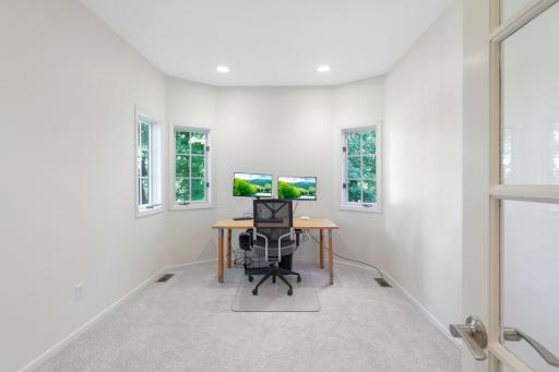 A convenient main floor office adjacent to the second half bathroom.