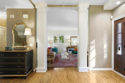 The main level family room is flooded with natural light and offers beautiful views of the front yard.