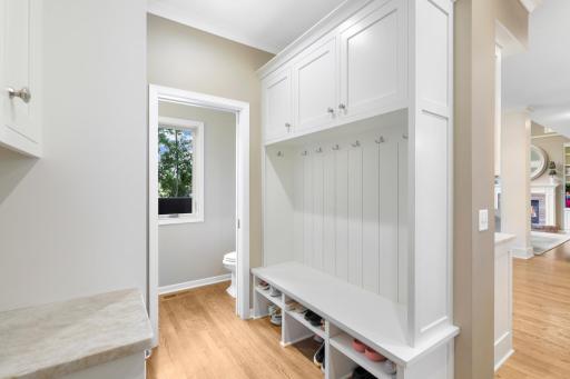 The mudroom and half bath located just off the garage entry.