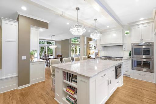 The newly remodeled, stunning, open concept, chefâs kitchen features Thermador and Viking appliances, in-cabinet lighting, a massive pantry with prep space and natural light, and a large center island with stool seating that opens to the dining room.