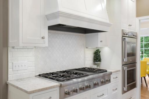 The newly remodeled, stunning, open concept, chefâs kitchen features Thermador and Viking appliances, in-cabinet lighting, a massive pantry with prep space and natural light, and a large center island with stool seating that opens to the dining room.