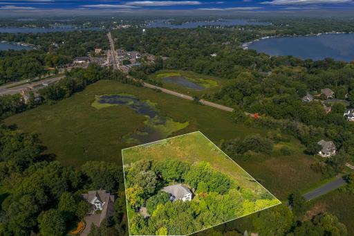The large, maturely wooded lot offers privacy and fantastic views.
