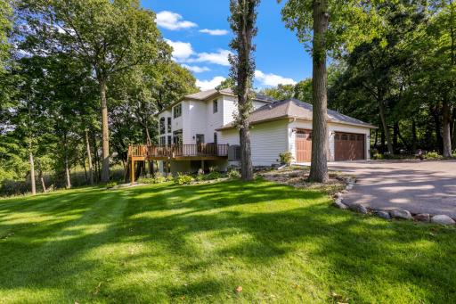 The home is set on a private, maturely wooded, acreage lot, on a quiet, charming cul-de-sac that gives Coastal Hamptons vibes, offering low traffic, 360-degree views, a rare combination of privacy and natural light, and plenty of usable yard space.