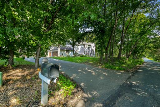 The home is set on a private, maturely wooded, acreage lot, on a quiet, charming cul-de-sac that gives Coastal Hamptons vibes, offering low traffic, 360-degree views, a rare combination of privacy and natural light, and plenty of usable yard space.