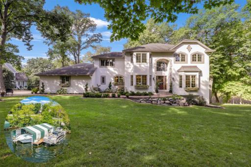 This beautifully renovated home sits on a private, maturely wooded lot with water views from three sides of the house.