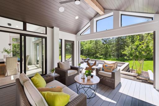 3 season porch with gas fire place and phantom screen.