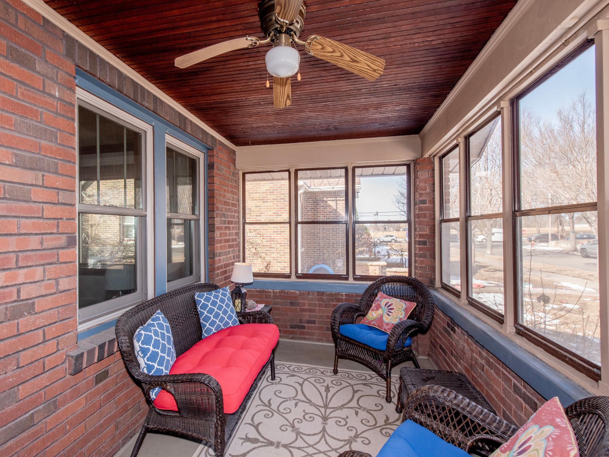 Bright and airy front porch welcomes you in