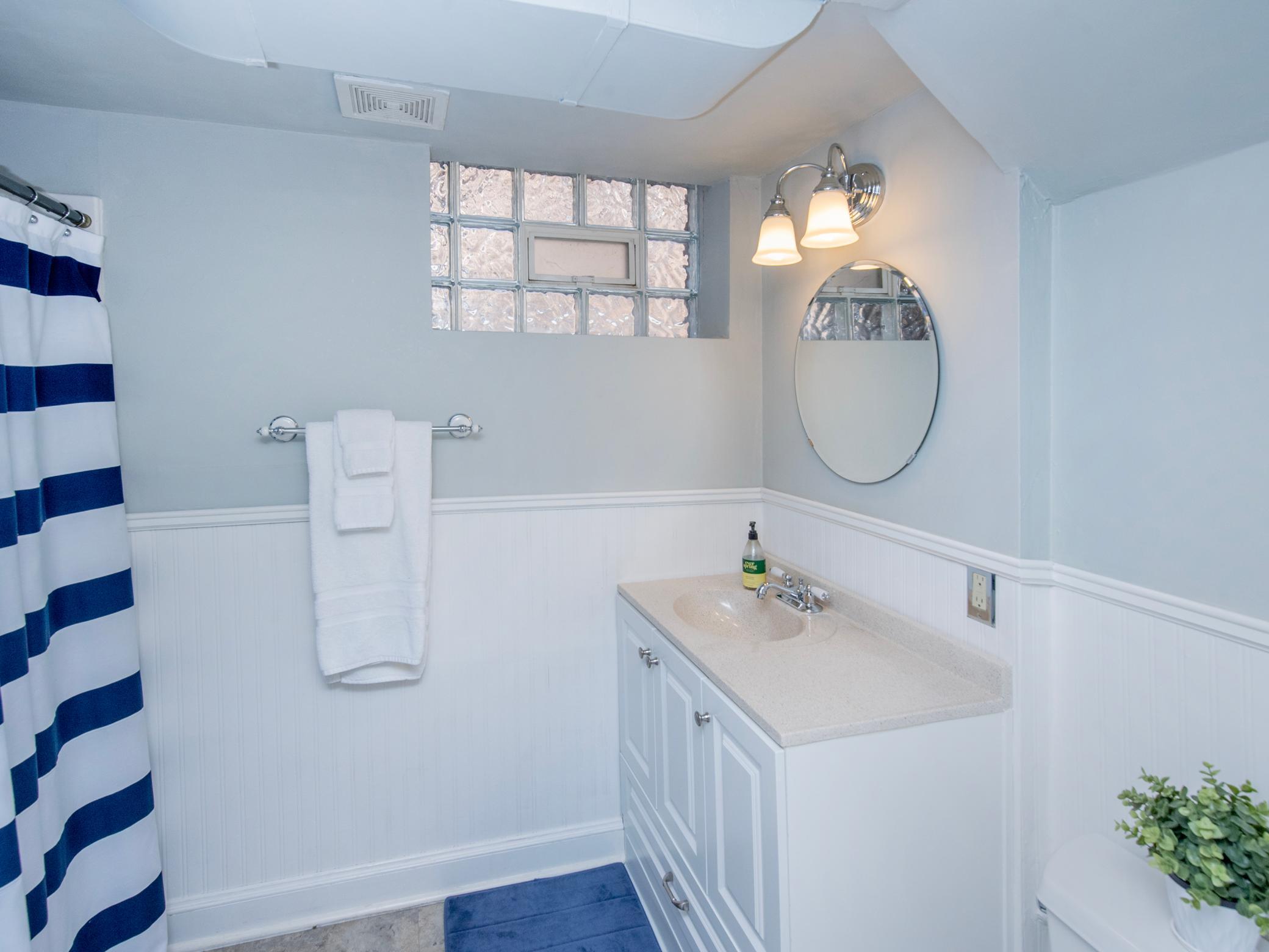 Newer 3/4 bath in the lower level features walk-in shower