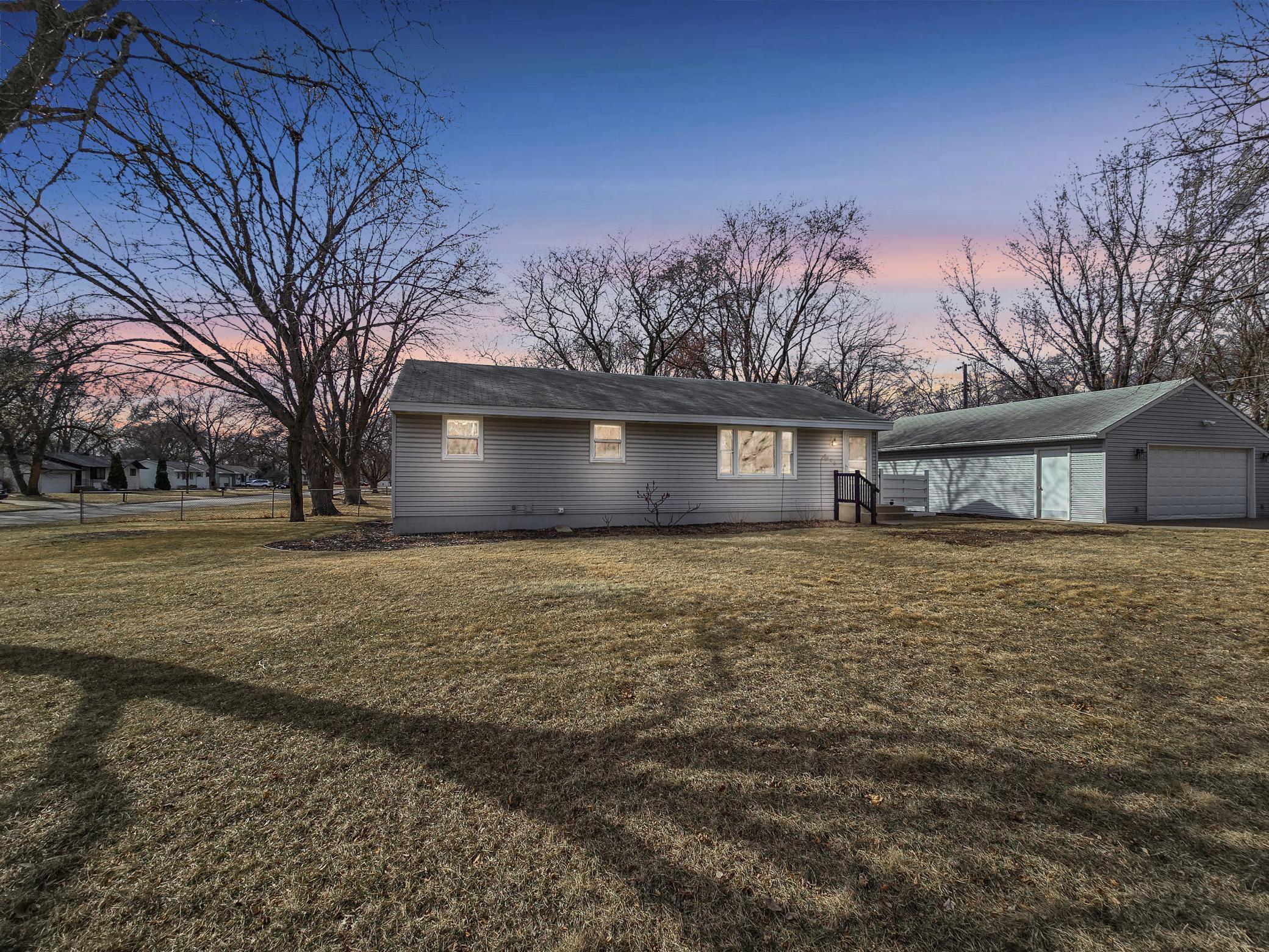 Desirable Rambler on large, flat corner lot!