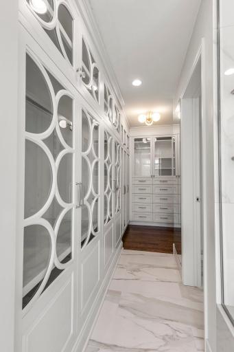 A private Asko washer & dryer and the generous 12x5 walk-in closet includes built-in cabinetry for optimal organization.