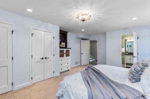 This 20x15 room features plush carpeting, abundant closet space and built-in cabinetry.