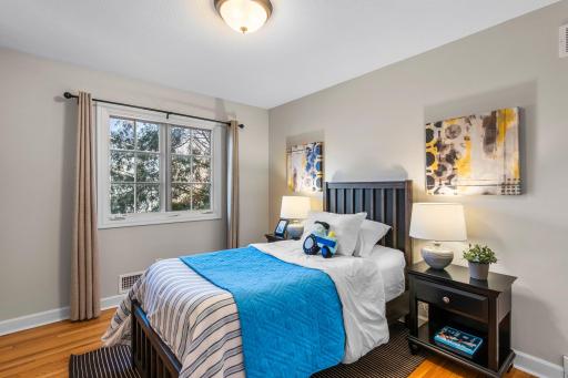 Each featuring rich hardwood flooring and generous closet space.