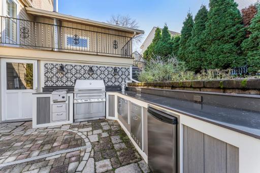 Designed for indoor-outdoor living, the backyard is an entertainerâs paradise. It features an outdoor kitchen with a beverage fridge and electrical hookups.