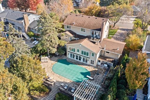 Surrounded by a beautifully landscaped yard, it offers a private oasis for relaxation and entertaining.