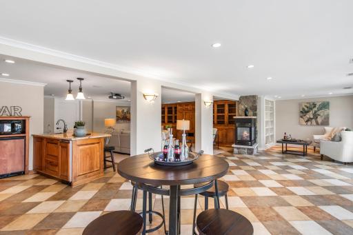With heated tile flooring for year-round comfort, and elegant French doors leading to the back patio.