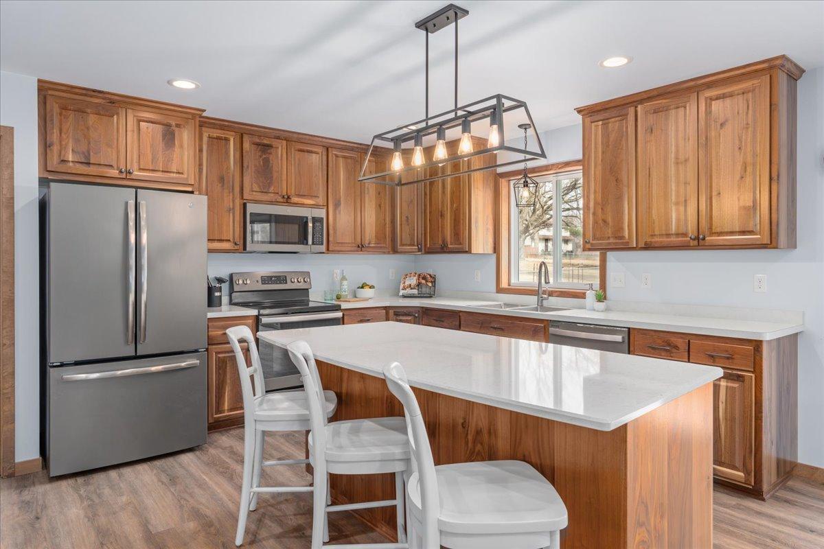 Granite countertops, slate appliances, and large center island